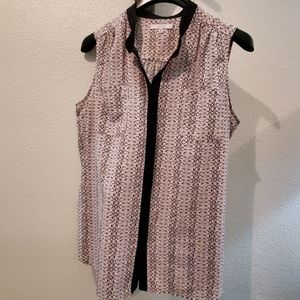 **3/$15 **Women's sleeveless blouse